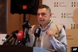 Nizar Zakka, head of Hostage Aid Worldwide, speaks about American journalist Austin Tice during a press conference in Damascus, Syria, Dec. 24, 2024.