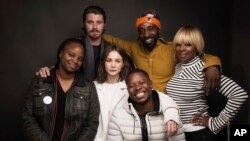Director Dee Rees, from left, actors Garrett Hedlund, Rob Morgan, Mary J. Blige, Carrey Mulligan, center, and Jason Mitchell, bottom, pose for a portrait to promote the film, "Mudbound," at the Music Lodge during the Sundance Film Festival, Jan. 21, 2017, in Park City, Utah.