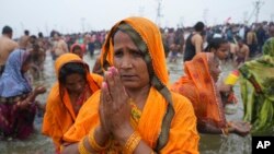 Hindu devotees pray during the Maha Kumbh festival in Prayagraj, India, Jan. 29, 2025.