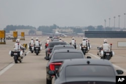 A motorcade escort convoy carries Ethiopian Prime Minister Abiy Ahmed at the Beijing Capital International Airport, ahead of the 2024 Summit of the Forum on China-Africa Cooperation in Beijing on Sept. 4, 2024.