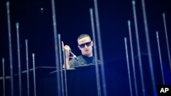 FILE - DJ Snake performs at the 2015 Coachella Music and Arts Festival.