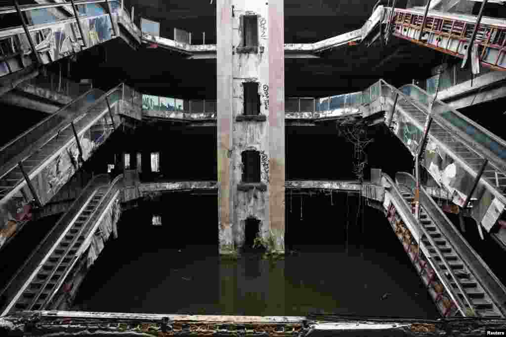 An abandoned department store is seen flooded in Bangkok, Thailand.