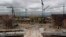 FILE - Construction work is seen on a new airport in Texcoco, Mexico, Oct. 17, 2018.
