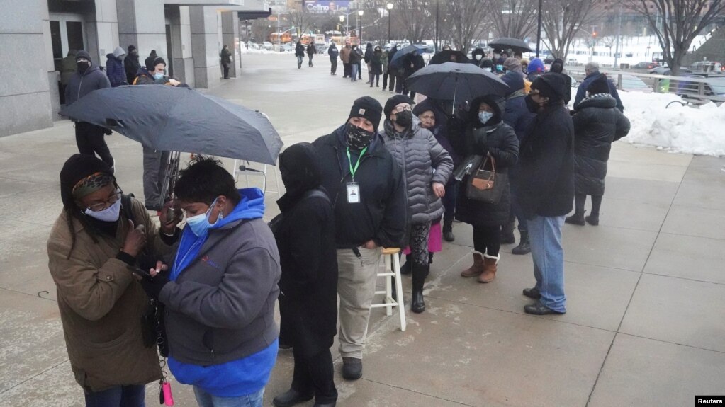 People line up outside Yankee stadium for vaccines amid the coronavirus disease (COVID-19) pandemic in the Bronx borough of New York City, New York, Feb. 5, 2021.