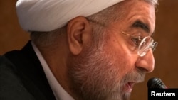 Iran's President Hassan Rouhani speaks to journalists during a news conference in New York on September 27, 2013. 