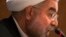 Iran's President Hassan Rouhani speaks to journalists during a news conference in New York, Sept. 27, 2013.