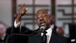 FILE - U.S. Sen. Raphael Warnock, D-Ga., a senior pastor at Ebenezer Baptist Church, speaks at the church, January 15, 2023, in Atlanta.