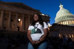 Rep. Cori Bush, D-Mo., speaks with reporters as she camps outside the U.S. Capitol, in Washington, Aug. 2, 2021.