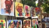 An artist, who displays his art for sale on the street, says he is glad the tension between the U.S. and Cuba is coming to an end, Aug. 13, 2015. (Celia Mendoza/VOA)