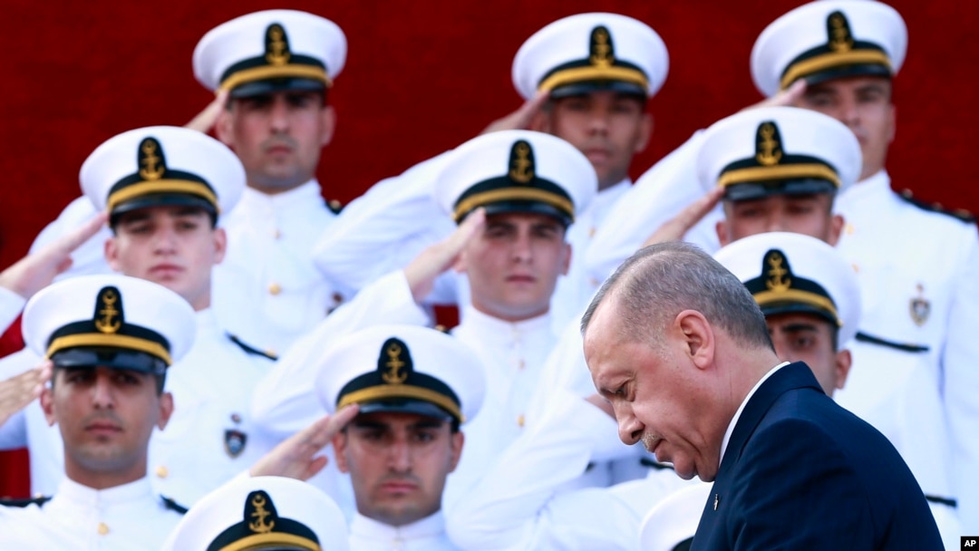 Turkey's Recep Tayyip Erdogan arrives to speak to military academy graduates in Istanbul, Aug. 31, 2019. Turkey has threatened to launch an offensive into Syria if plans to establish a safe zone along Turkey's border fail to meet his expectations.