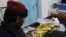 An injured boy receives treatment at a hospital after an airstrike in Helmand province, southern Afghanistan, Nov. 28, 2018. 
