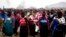 FILE - Maria de Jesus Patricio, presidential candidate for the National Indigenous Congress, campaigns with an escort of masked indigenous women in the Zapatista stronghold of Oventic in the southern state of Chiapas, Mexico, Oct. 19, 2017. Independent candidates are being forced to use a smartphone app to collect the hundreds of thousands of signatures they need to get on the ballot in a country where coverage is spotty and a minority can afford smartphones.