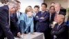 Body Language: Photo of Merkel, Trump Captures G-7 Tensions