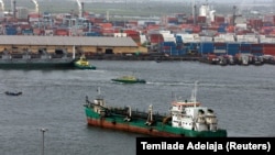 FILE: The port of lagos is seen from a rooftop in Nigeria's commercial capital, on March 16, 2020. The Chinese Navy made a port call at Lagos on Suday, July 2, 2023.