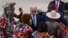 U.S. President Joe Biden watches a traditional dance after arriving at Catumbela airport in Angola, Dec. 4, 2024.