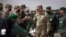 FILE - Gen. Stephen J. Townsend, head of the United States Africa Command, center, arrives to watch a large-scale drill in Morocco in June 2021.