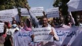 Sudanese journalist protest in Khartoum, Sudan, Nov.16, 2021. The placard in the middle reads: "free press will remain, tyrants are fleeting."