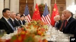 Predsjednici Kine i SAD, Ši Đinping i Donald Trump, tokom susreta u Buenos Airesu, 1. decembar 2018.