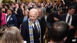 President Joe Biden departs after signing a proclamation to establish the Chuckwalla National Monument and the Sáttítla Highlands National Monument during an event in the East Room of the White House in Washington, Jan. 14, 2025.