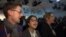 In this image made from video, protesters sing during climate talks at the World Climate Conference in Bonn, Germany, Nov. 13, 2017.