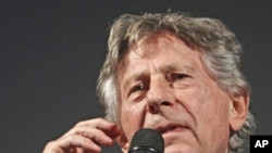 Polish-born film director Roman Polanski speaks as he picks up the award for his life work at the Film Festival in Zurich, Swzitzerland, Sept.27, 2011