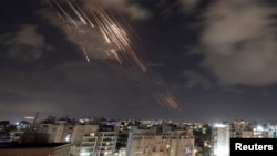 Israel's Iron Dome anti-missile system intercepts rockets, as seen from Ashkelon