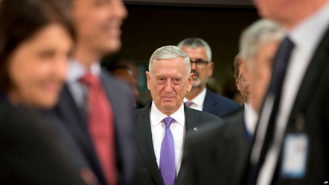 FILE - U.S. Secretary for Defense Jim Mattis arrives for a meeting of NATO defense ministers at NATO headquarters in Brussels, June 29, 2017.
