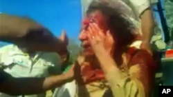 Mount Sinabung spews ash as seen from Payung village in Karo district, North Sumatra province, Indonesia, Feb. 3, 2014.