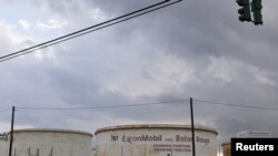 FILE - Storage tanks are seen inside the Exxon Mobil Baton Rouge Refinery in Baton Rouge, La., Nov. 6, 2015. 
