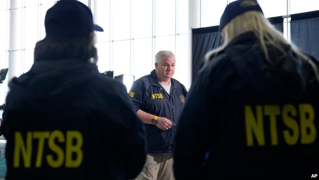 National Transportation Safety Board member Todd Inman speaks with reporters at Ronald Reagan Washington National Airport, in Arlington, Virginia, Jan. 31, 2025.