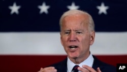 Democratic presidential candidate former Vice President Joe Biden gestures during a campaign stop in Manchester, N.H., Oct. 9, 2019. 