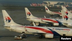 Самолеты Malaysia Airlines в международном аэропорту Куала-Лумпур. 25 июля 2014 г.