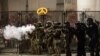 Federal agents use crowd control munitions to disperse Black Lives Matter demonstrators during a protest at the Mark O. Hatfield United States Courthouse, July 24, 2020, in Portland, Oregon. 