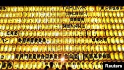 Visitors look at thousands paper lanterns during the Mitama Festival at the Yasukuni Shrine, where more than 2.4 million war-dead are enshrined in Tokyo, Japan.