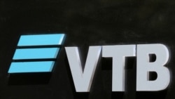 FILE PHOTO: The logo of VTB bank is seen on the bank's headquarters in Tehran