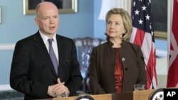 Secretary of State Hillary Rodham Clinton, right, hosts a meeting with British Foreign Secretary William Hague, at the State Department in Washington, Wednesday, Nov. 17, 2010. Hague used this month's British presidency of the UN security council today to