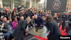 Pete Townshend and Roger Daltrey of The Who attend the unveiling of the founding stone of the new Music Walk of Fame in London, Britain, Nov. 19, 2019.