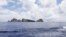 A group of disputed islands known as Senkaku in Japan and Diaoyu in China is seen from the city government of Tokyo's survey vessel in the East China Sea, September 2, 2012.