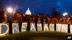 Demonstrators rally in support of Deferred Action for Childhood Arrivals (DACA) outside the Capitol, in Washington, Jan 21, 2018.