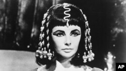 Actress Elizabeth Taylor poses as Queen Cleopatra in this photo from Joseph L. Mankiewiez' 1963 film, "Cleopatra."