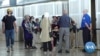 Afghan Evacuees Confused Over Status in US