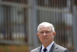FILE - Attorney General Jeff Sessions is shown during a news conference in San Diego near the border with Tijuana, Mexico, May 7, 2018.