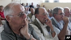 Some of the white farmers who lost their farms during the chaotic land reform exercise. 