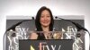 VOA reporter June Soh with a Bronze Medal from the New York Festivals Television & Film Awards