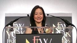 VOA reporter June Soh with a Bronze Medal from the New York Festivals Television & Film Awards