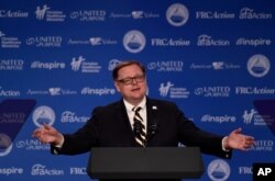 FILE - Todd Starnes of Fox News speaks at the 2018 Values Voter Summit in Washington, Sept. 22, 2018.