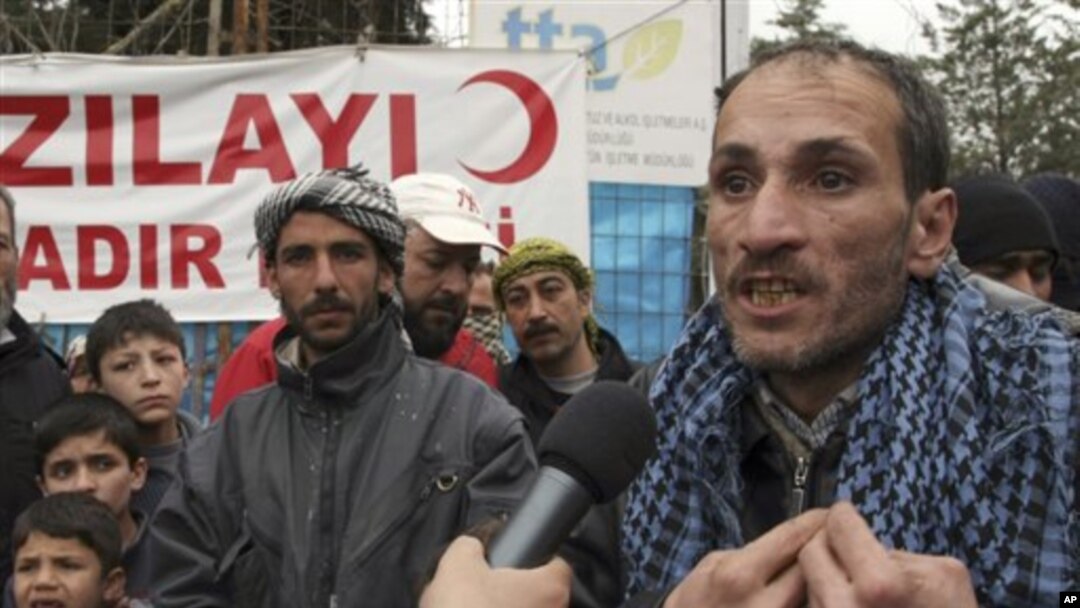 Syrian refugee Nizar Hajyousuf speaks in Yayladagi, Turkey about about violence in his Syrian hometown, Jisr Ash Shugur, Mar 12, 2012.