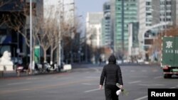 El distrito financiero de Beijing sigue desierto a pesar de la reanudación de las actividades laborales en China en medio de la epidemia de coronavirus el 11 de febrero de 2020. Foto Reuters