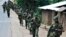 FILE - Congolese soldiers patrol the town of Rutshuru in eastern Congo, January 28, 2009. 