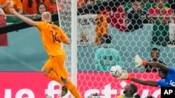 Netherlands midfielder Davy Klaassen scoring the second goal against Senegal during a 2022 FIFA World Cup fixture, Doha, November 21, 2022